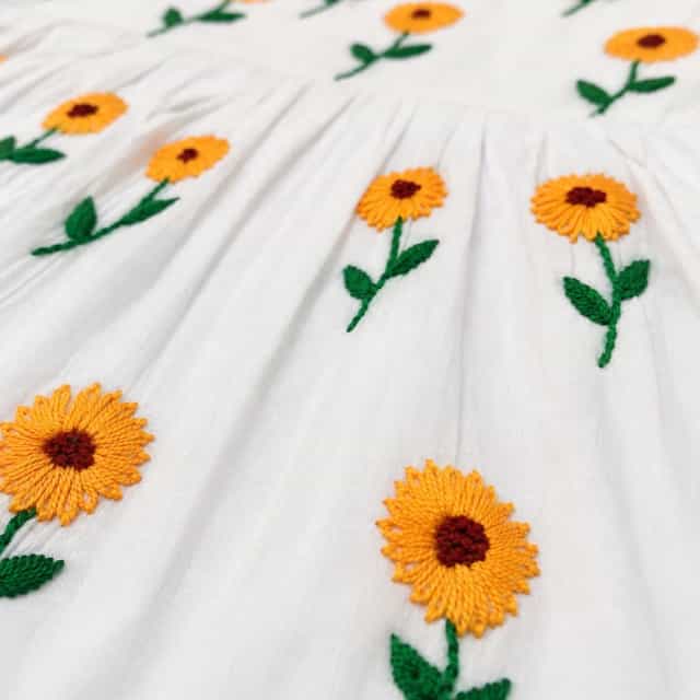 Sunflower Hand Embroidery Baby Dress with Matching Hairband White Cotton Baby Frock for Girls2 Sunflower Hand Embroidery Baby Dress with Matching Hairband | White Cotton Frock | Suta.bd